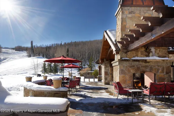 a view of a dry background with mountains in the background