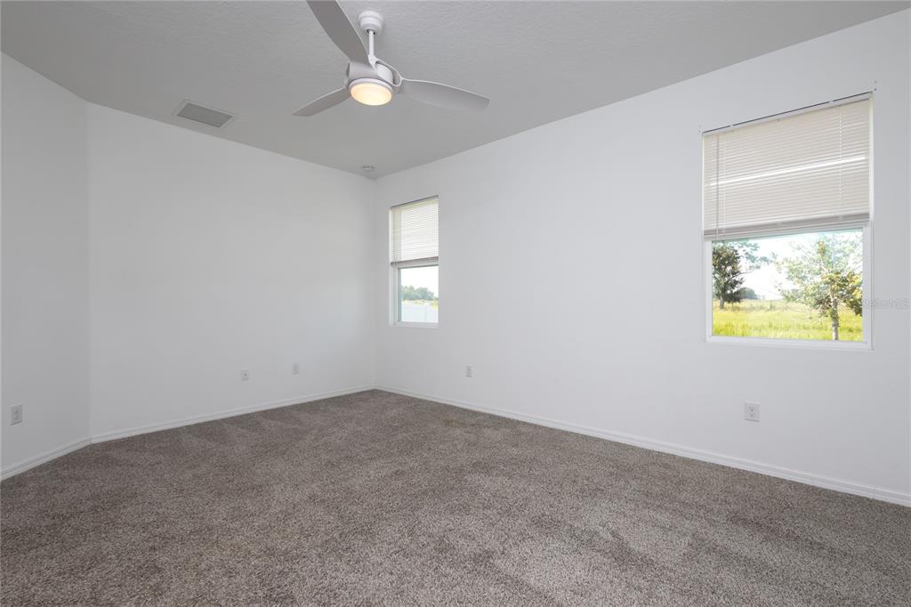 11851 Brighton Knoll Loop Riverview, FL 33579 - Photo 12 of 28 an empty room with windows