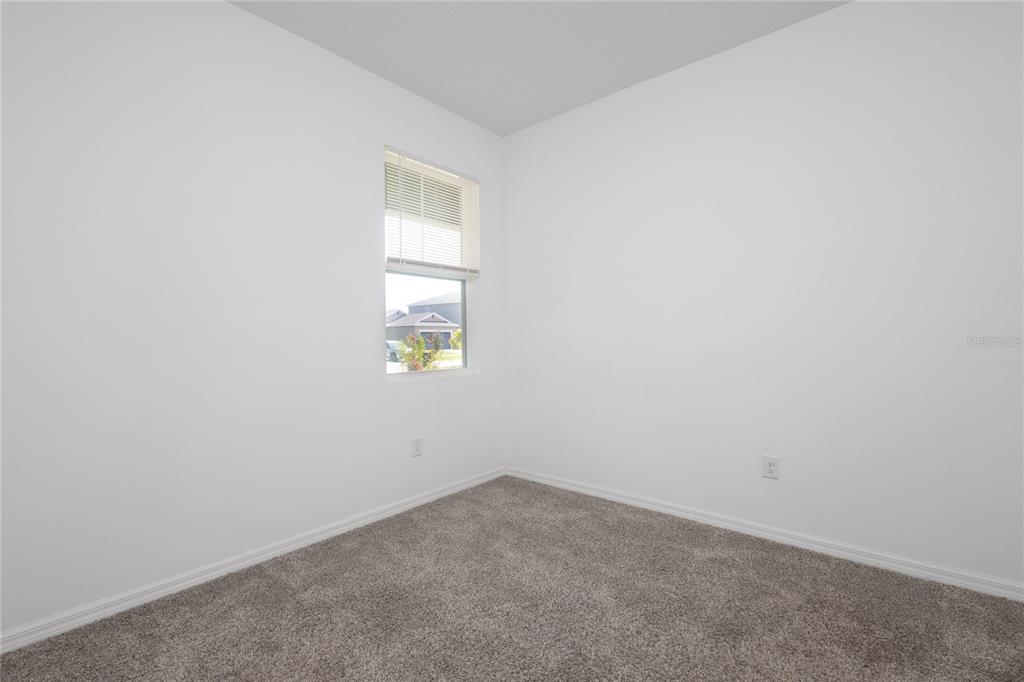 11851 Brighton Knoll Loop Riverview, FL 33579 - Photo 20 of 28 an empty room with a window