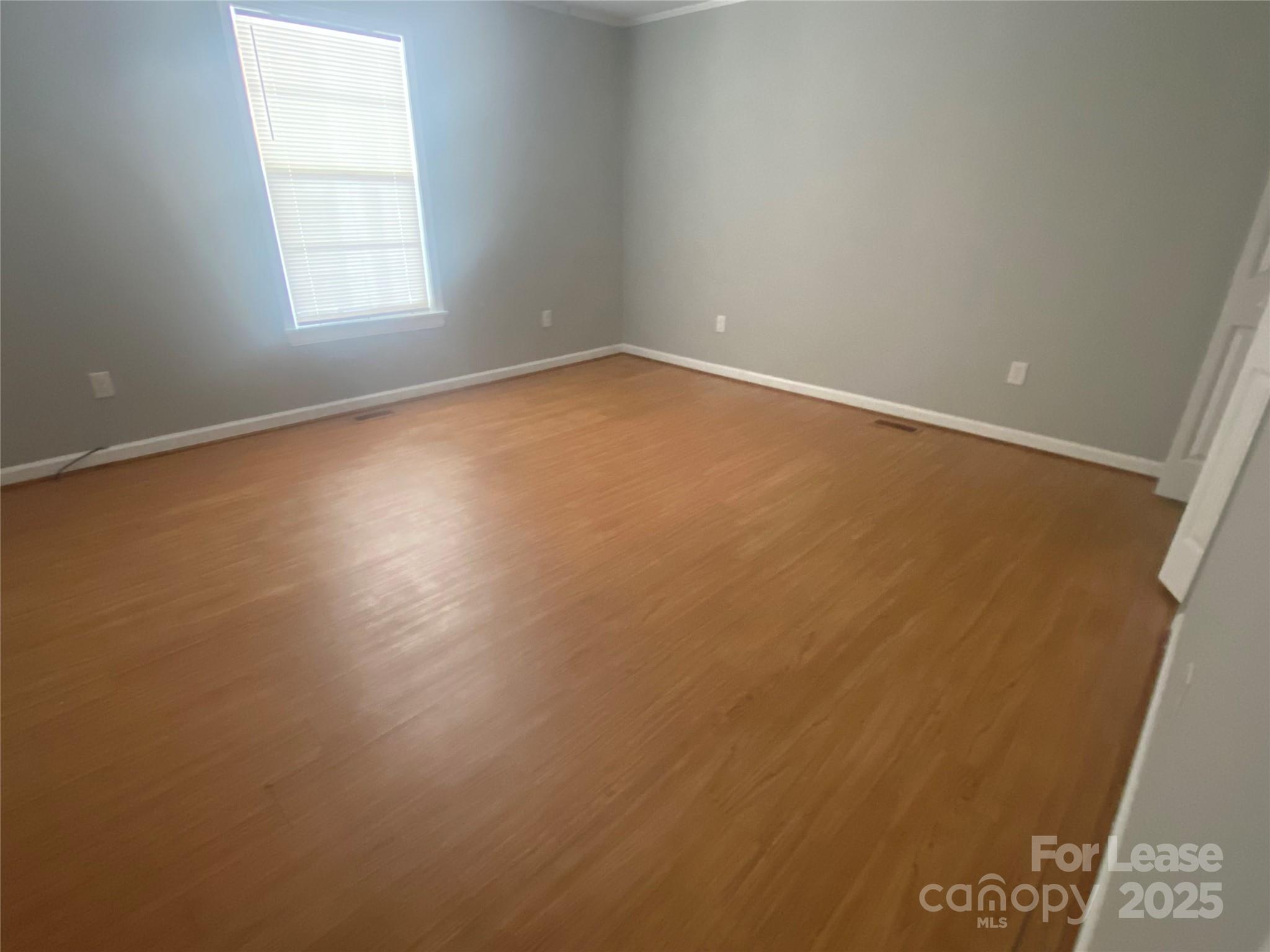 4530 Shiloh Unity Road Lancaster, SC 29720 - Photo 2 of 14 an empty room with a window