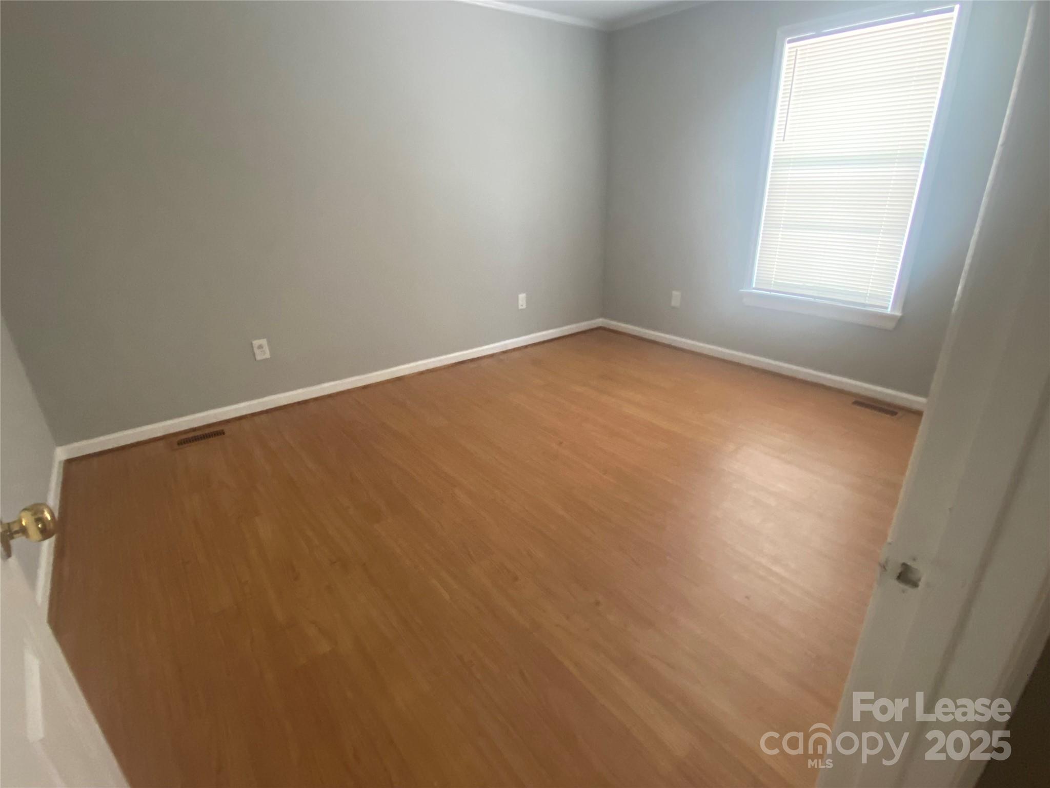 4530 Shiloh Unity Road Lancaster, SC 29720 - Photo 3 of 14 an empty room with a window