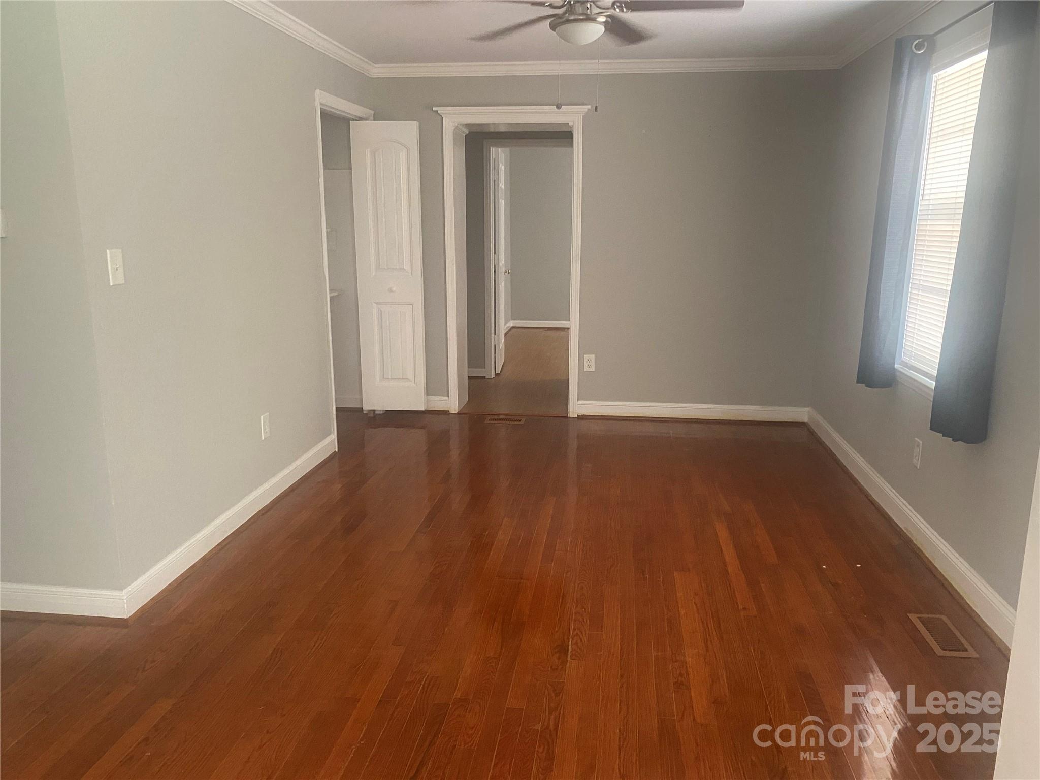 4530 Shiloh Unity Road Lancaster, SC 29720 - Photo 6 of 14 wooden floor in an empty room with a window