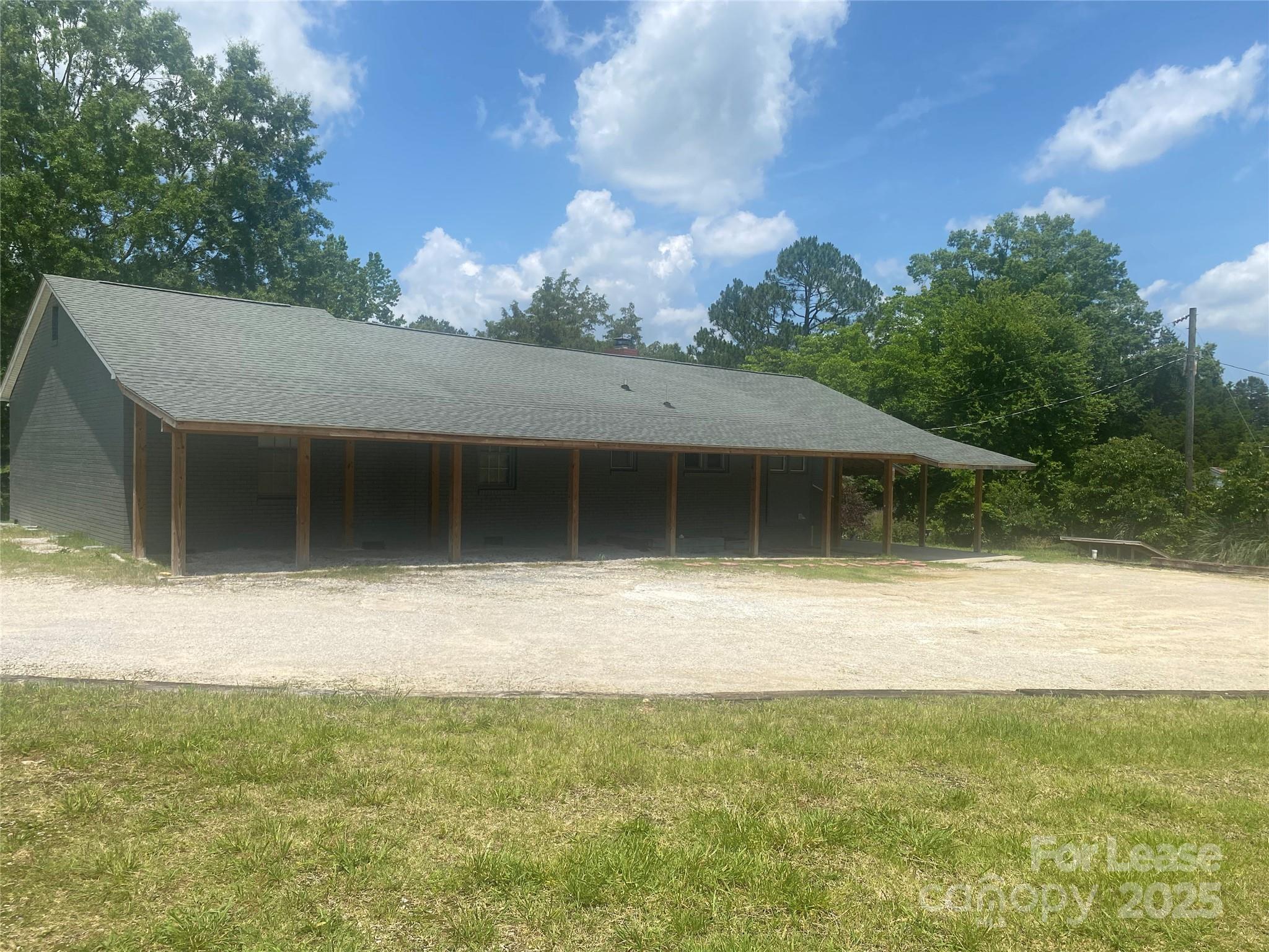 4530 Shiloh Unity Road Lancaster, SC 29720 - Photo 10 of 14 a view of house with backyard space and lake view