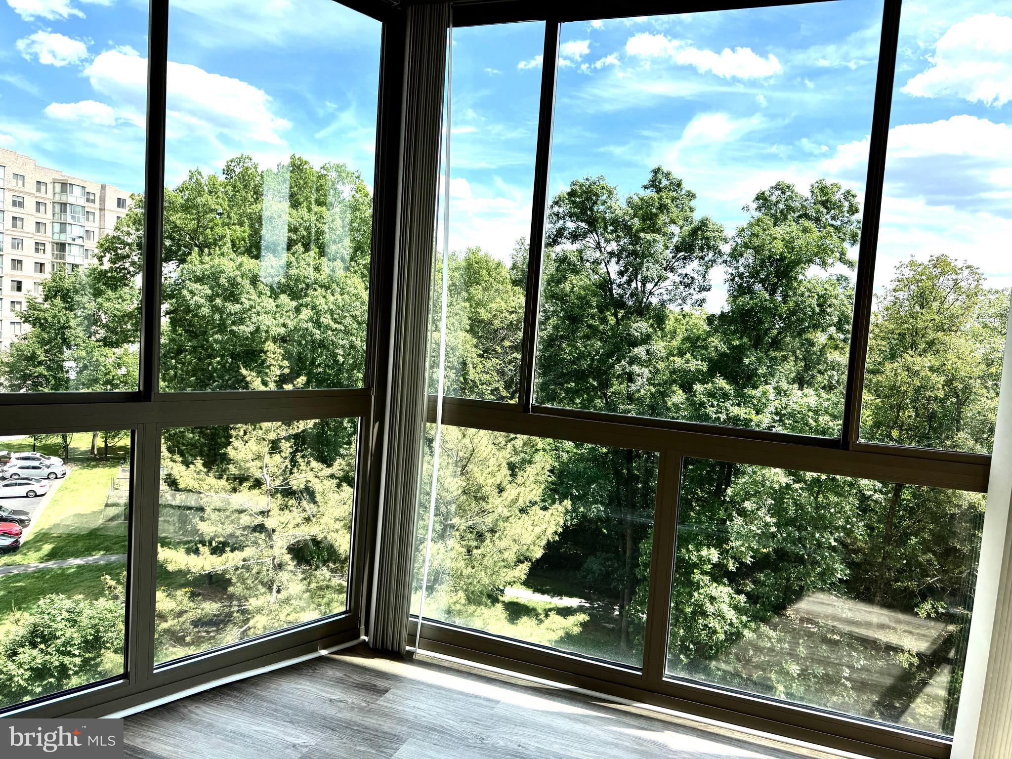 19375 Cypress Ridge Terrace, Unit 404 Leesburg, VA 20176 - Photo 6 of 8 Sunroom view West