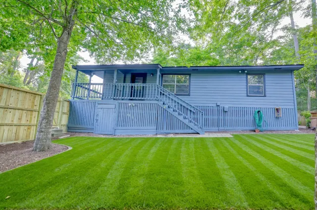 a view of a backyard with a tub