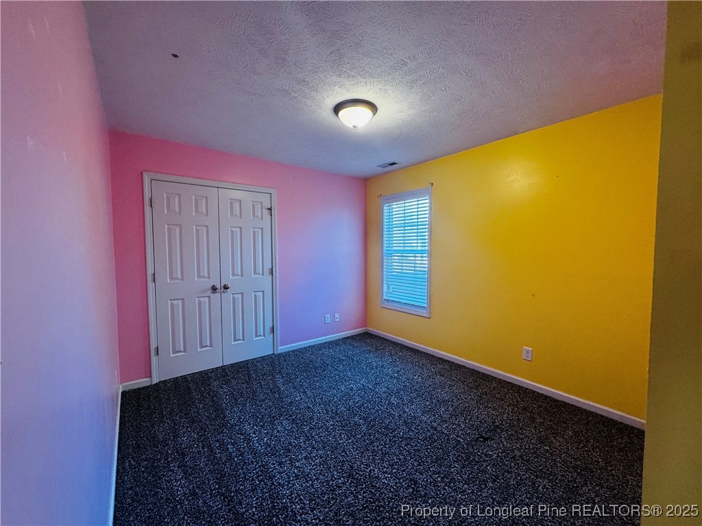 1516 Rough Rider Lane Parkton, NC 28371 - Photo 14 of 23 a view of empty room with window