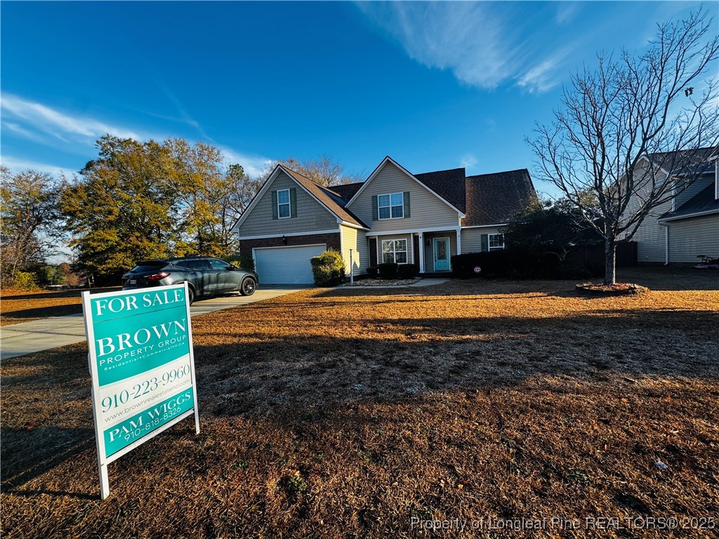 1516 Rough Rider Lane Parkton, NC 28371 - Photo 2 of 23 a view of a house with a yard