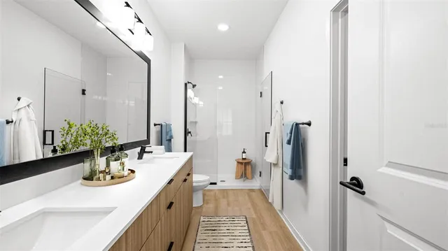 a kitchen with a sink and refrigerator