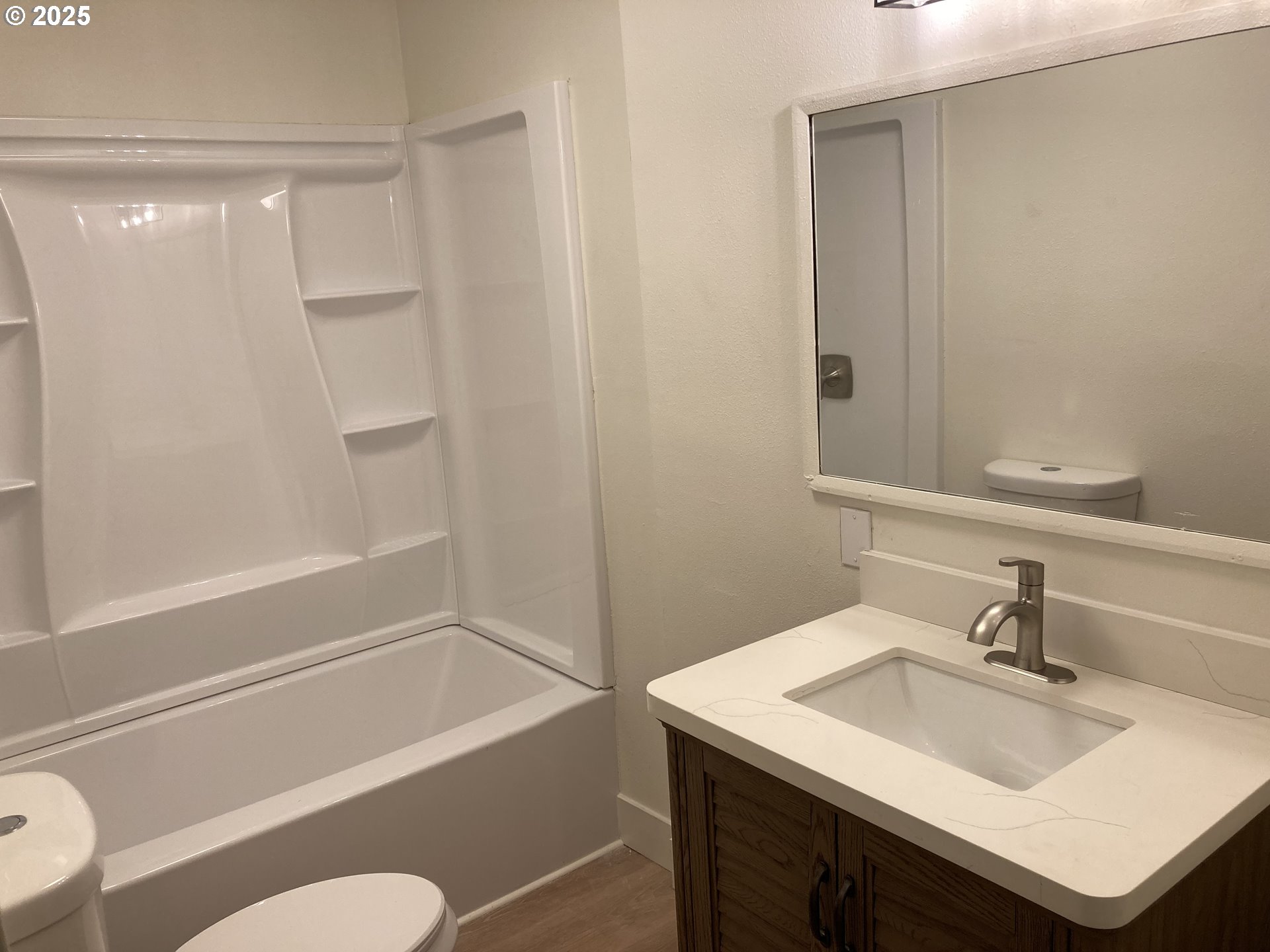 94034 Viking Street Junction City, OR 97448 - Photo 12 of 12 a bathroom with a sink toilet vanity and shower