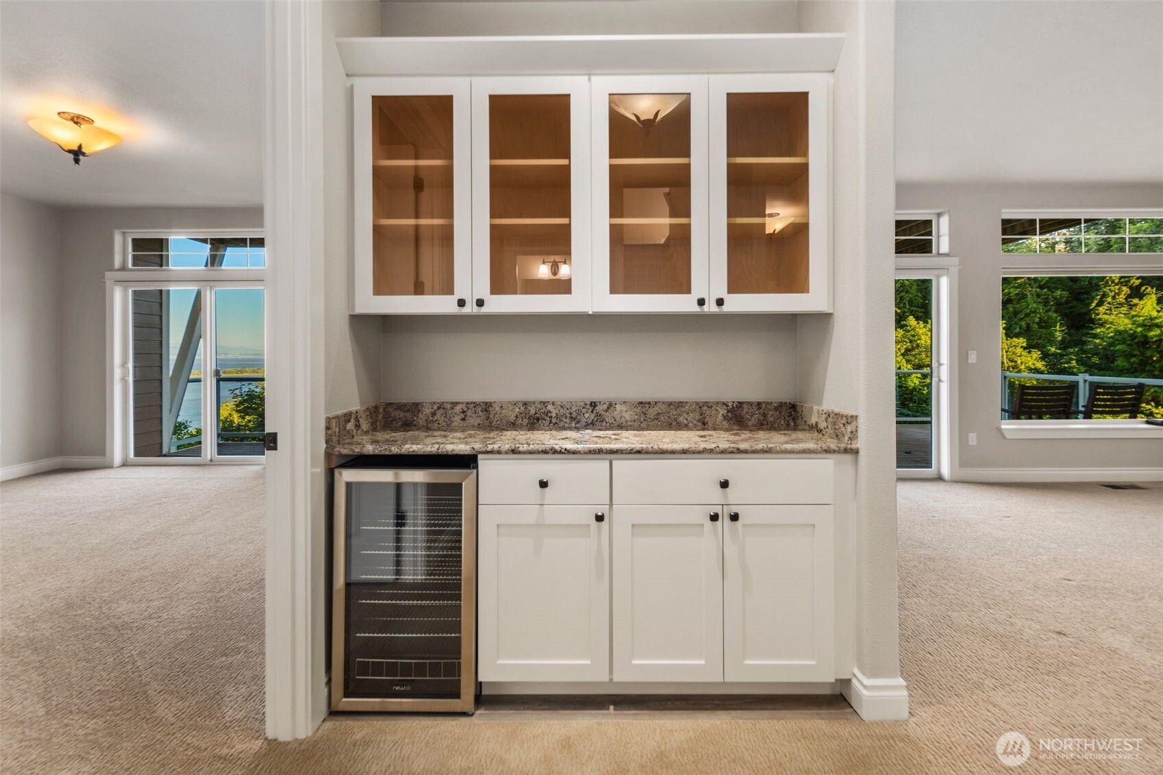 3224 Overlook Loop Ilwaco, WA 98624 - Photo 19 of 38 a kitchen with granite countertop a sink and a stove