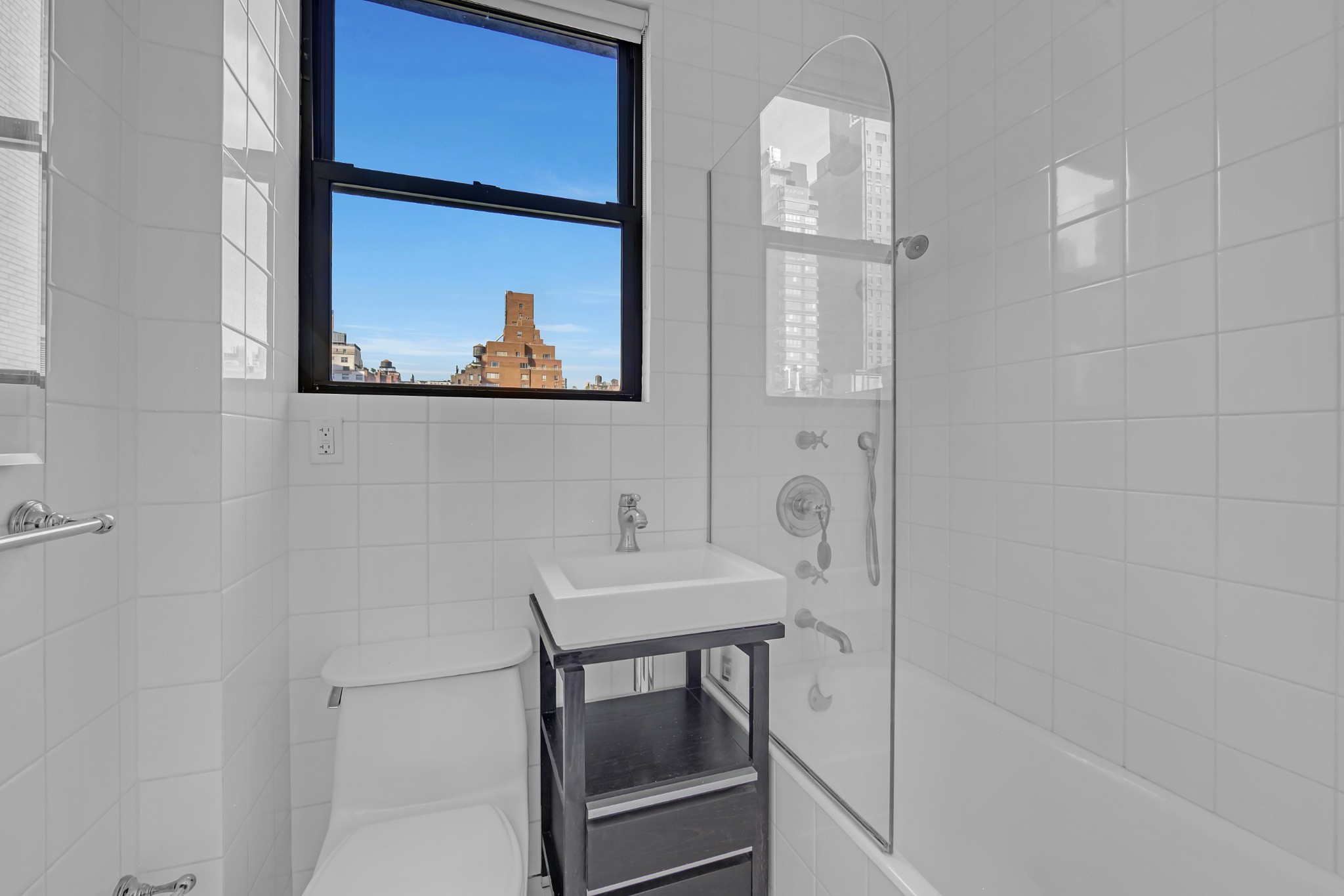 127 East 69th Street, Unit PH Manhattan, NY 10021 - Photo 10 of 11 a bathroom with a sink and a mirror