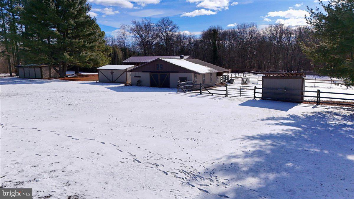 2620 Monmouth Road Jobstown, NJ 08041 - Photo 54 of 69 a view of a house with a yard covered in snow