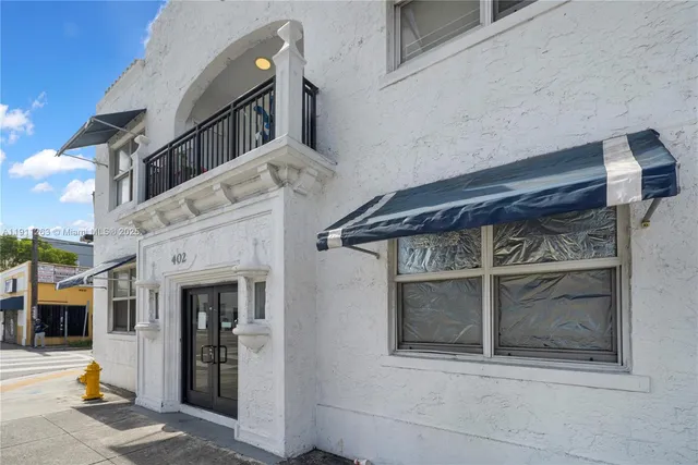 a front view of a house with a garage