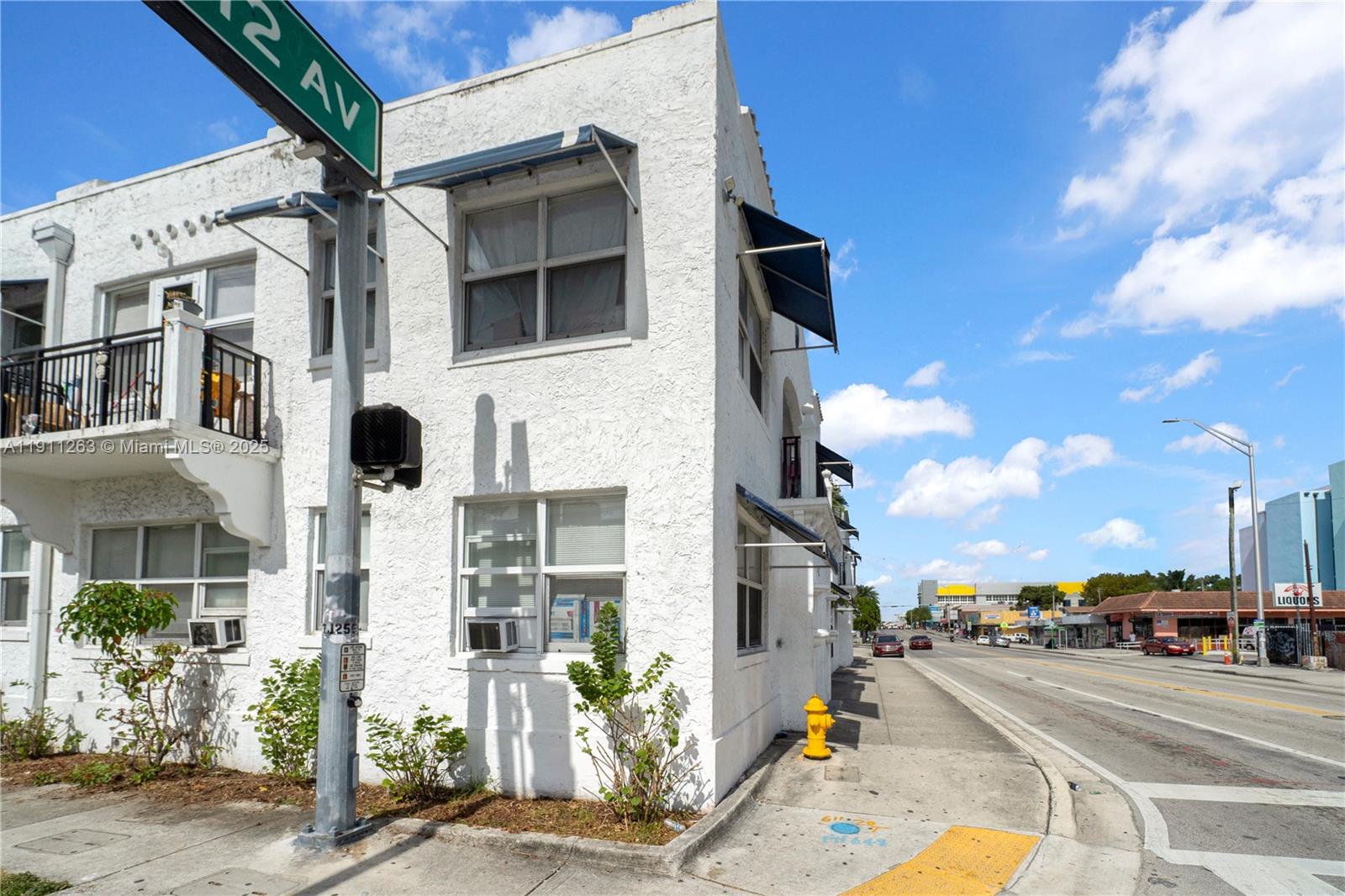 402 Northwest 12th Avenue, Unit 210 Miami, FL 33128 - Photo 15 of 16 a view of a building with a street