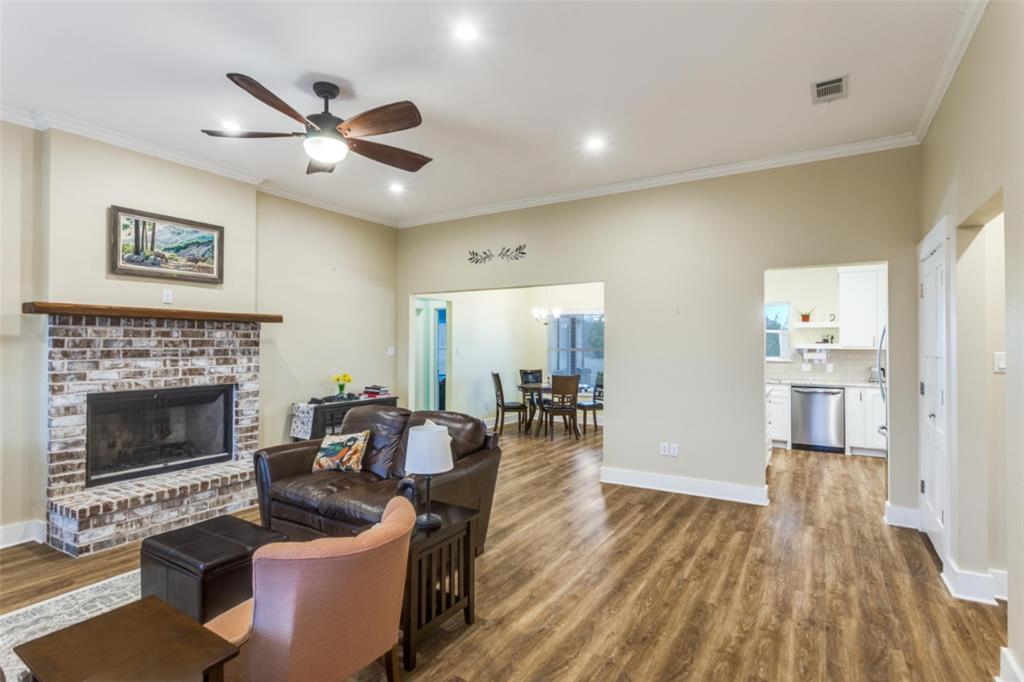 198 Fort Graham Whitney, TX 76692 - Photo 13 of 30 a living room with furniture and a fireplace