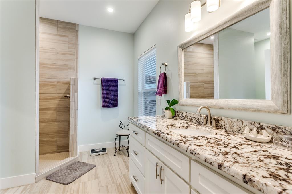 198 Fort Graham Whitney, TX 76692 - Photo 23 of 30 a bathroom with a sink and a mirror