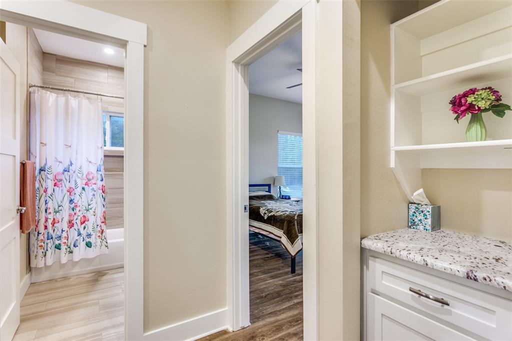 198 Fort Graham Whitney, TX 76692 - Photo 27 of 30 a room with a walk in closet and wooden floor