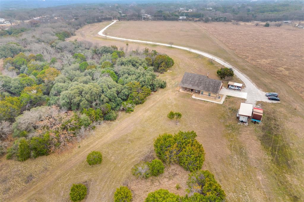 198 Fort Graham Whitney, TX 76692 - Photo 3 of 30 a view of a lake with a yard
