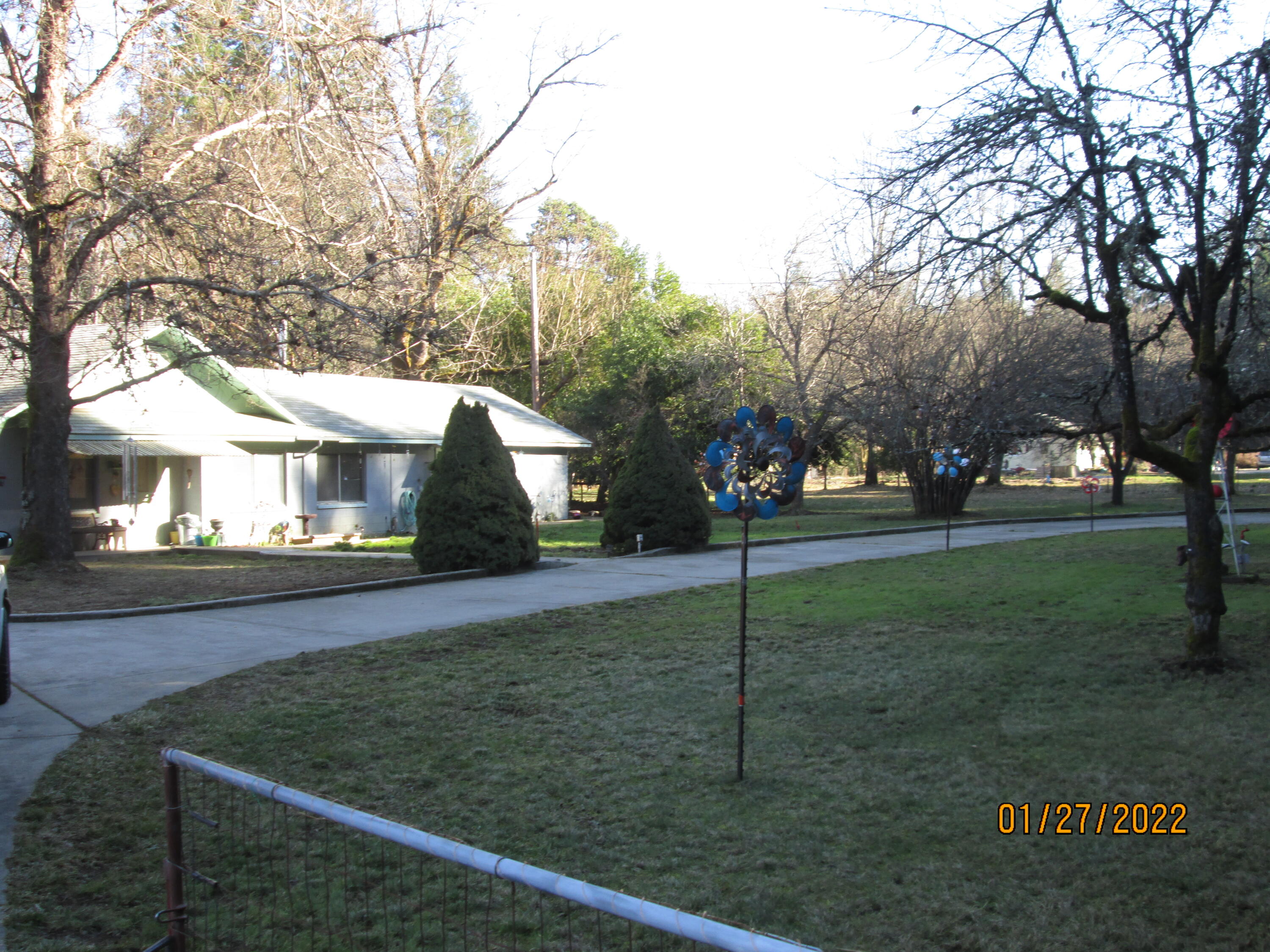 4940 Dick George Road Cave Junction, OR 97523 - Photo 2 of 22 Front of house with circular driveway