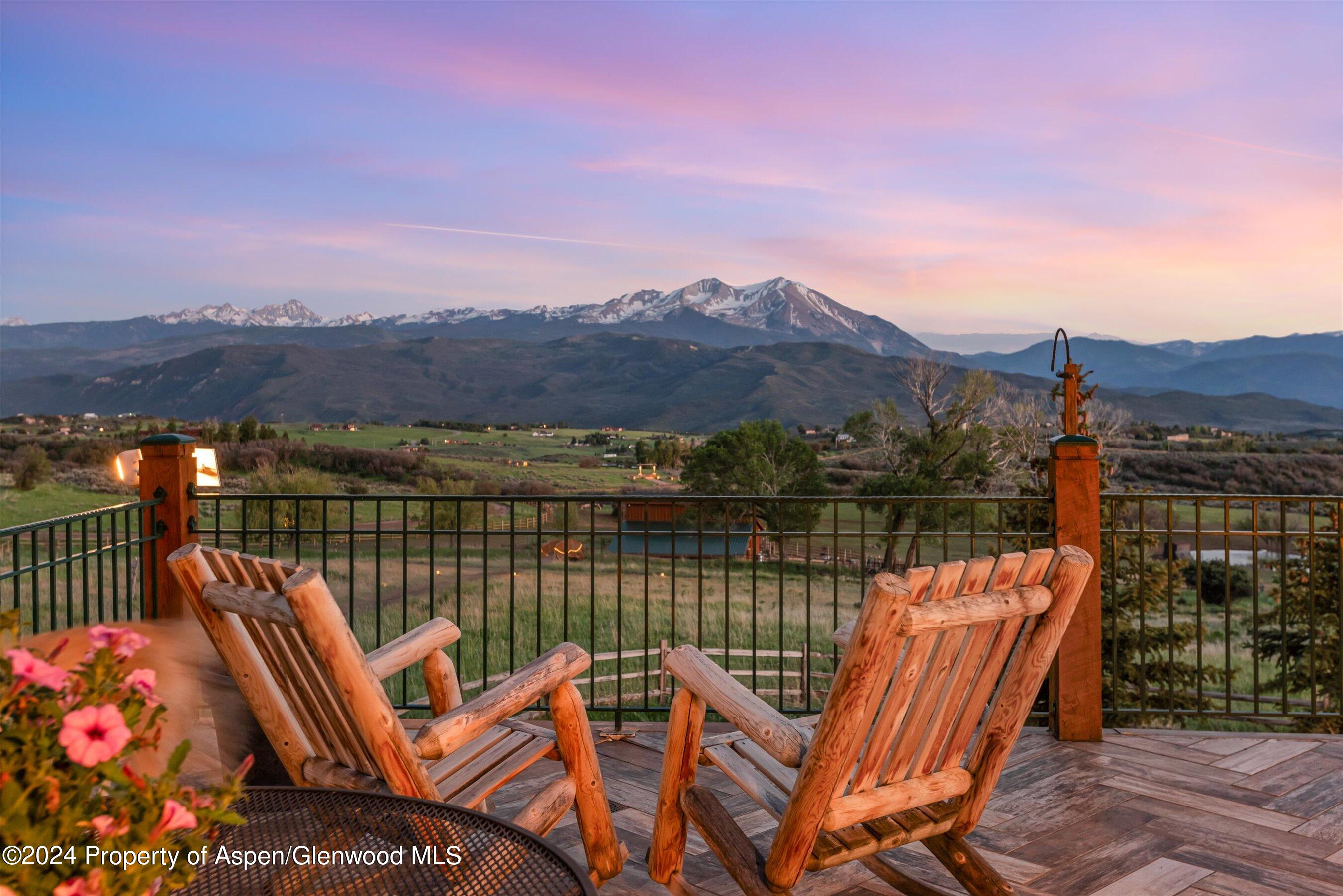 303 Park Meadows Lane Carbondale, CO 81623 - Photo 1 of 47 a view of a roof deck with couches