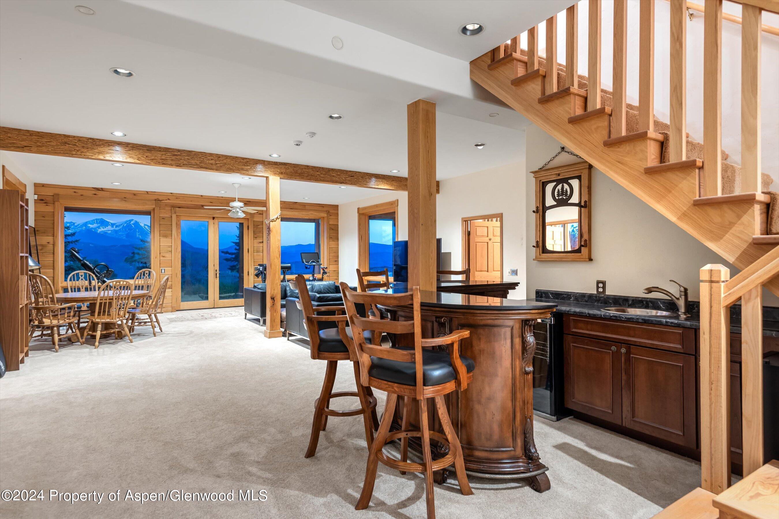 303 Park Meadows Lane Carbondale, CO 81623 - Photo 19 of 47 a view of a dining room with furniture window and outside view