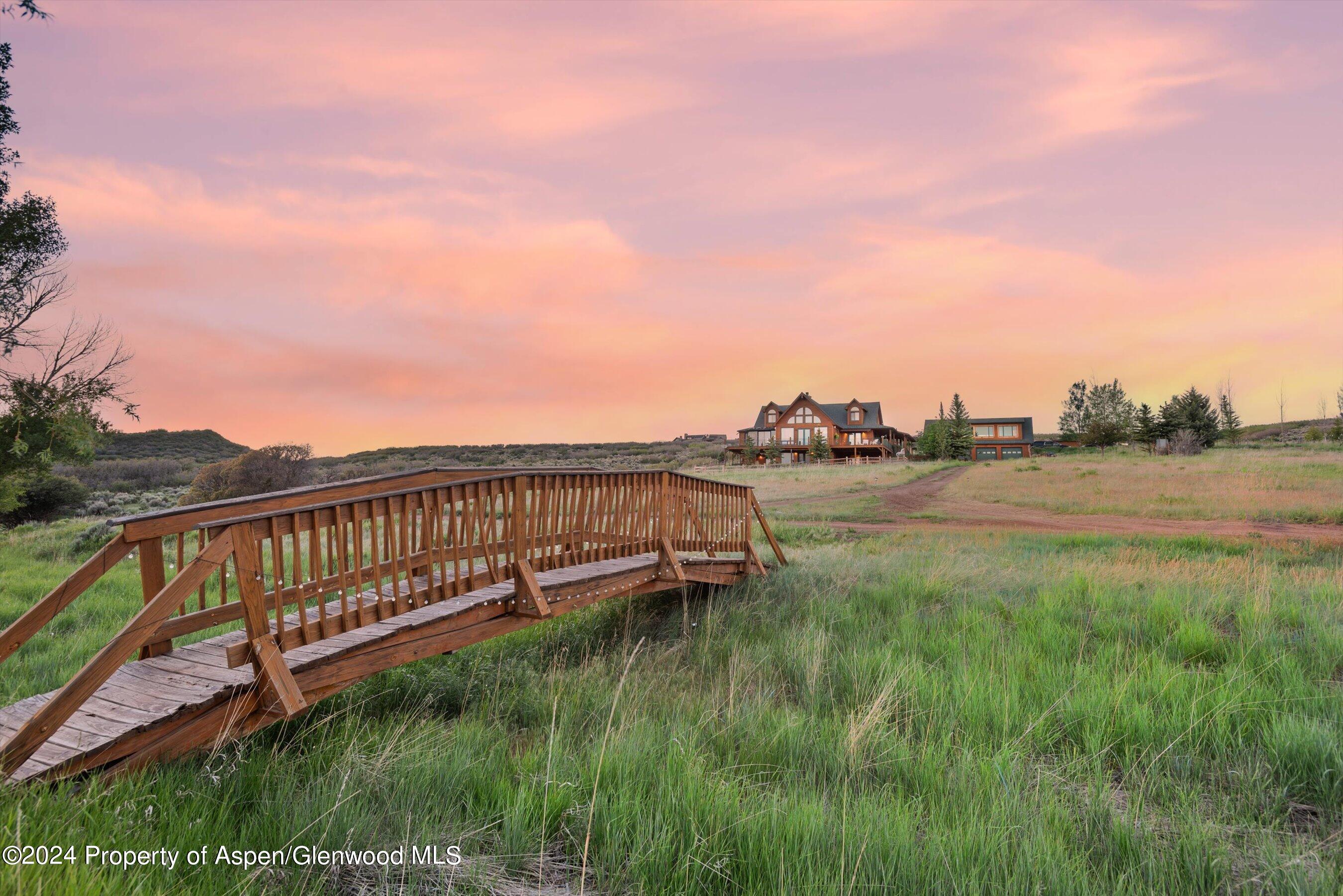 303 Park Meadows Lane Carbondale, CO 81623 - Photo 37 of 47 a view of a backyard with a lake view