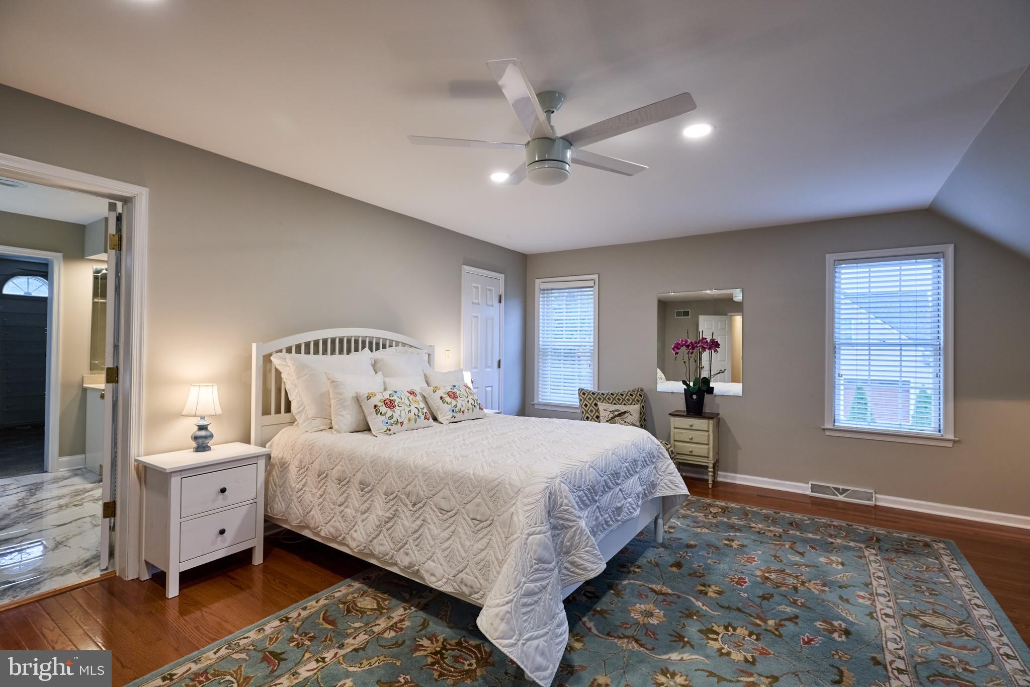 347 Buch Avenue Lancaster, PA 17601 - Photo 22 of 50 a bedroom with a bed and a chandelier