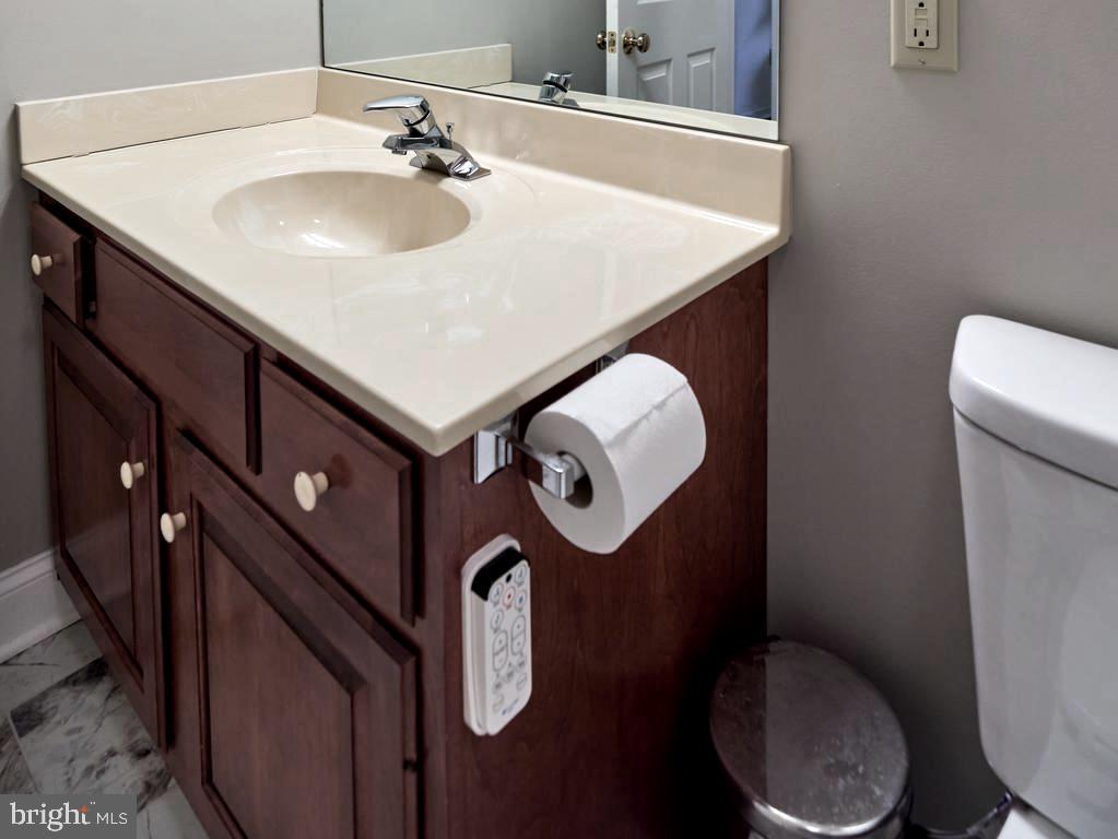 347 Buch Avenue Lancaster, PA 17601 - Photo 29 of 50 a bathroom with a sink a toilet and a mirror