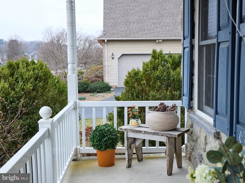 347 Buch Avenue Lancaster, PA 17601 - Photo 3 of 50 a balcony with table and chairs and potted plants