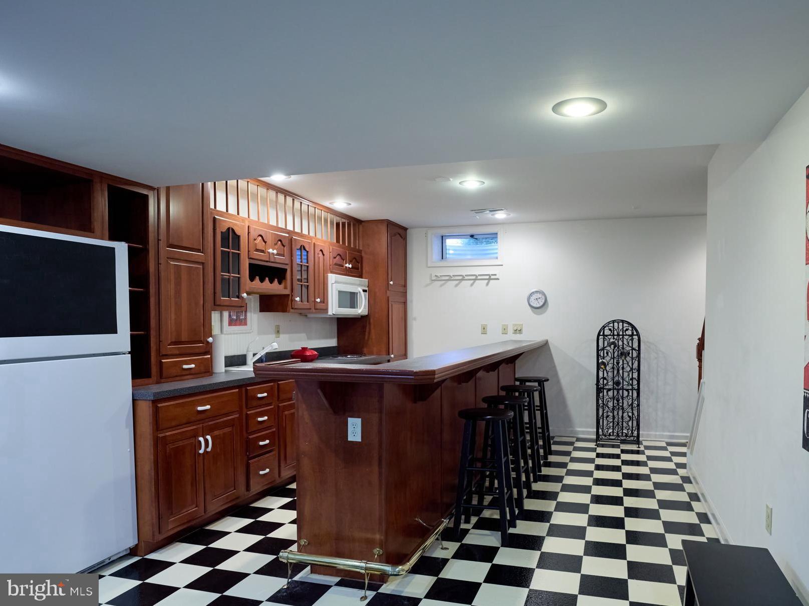 347 Buch Avenue Lancaster, PA 17601 - Photo 37 of 50 a kitchen with a sink and a refrigerator