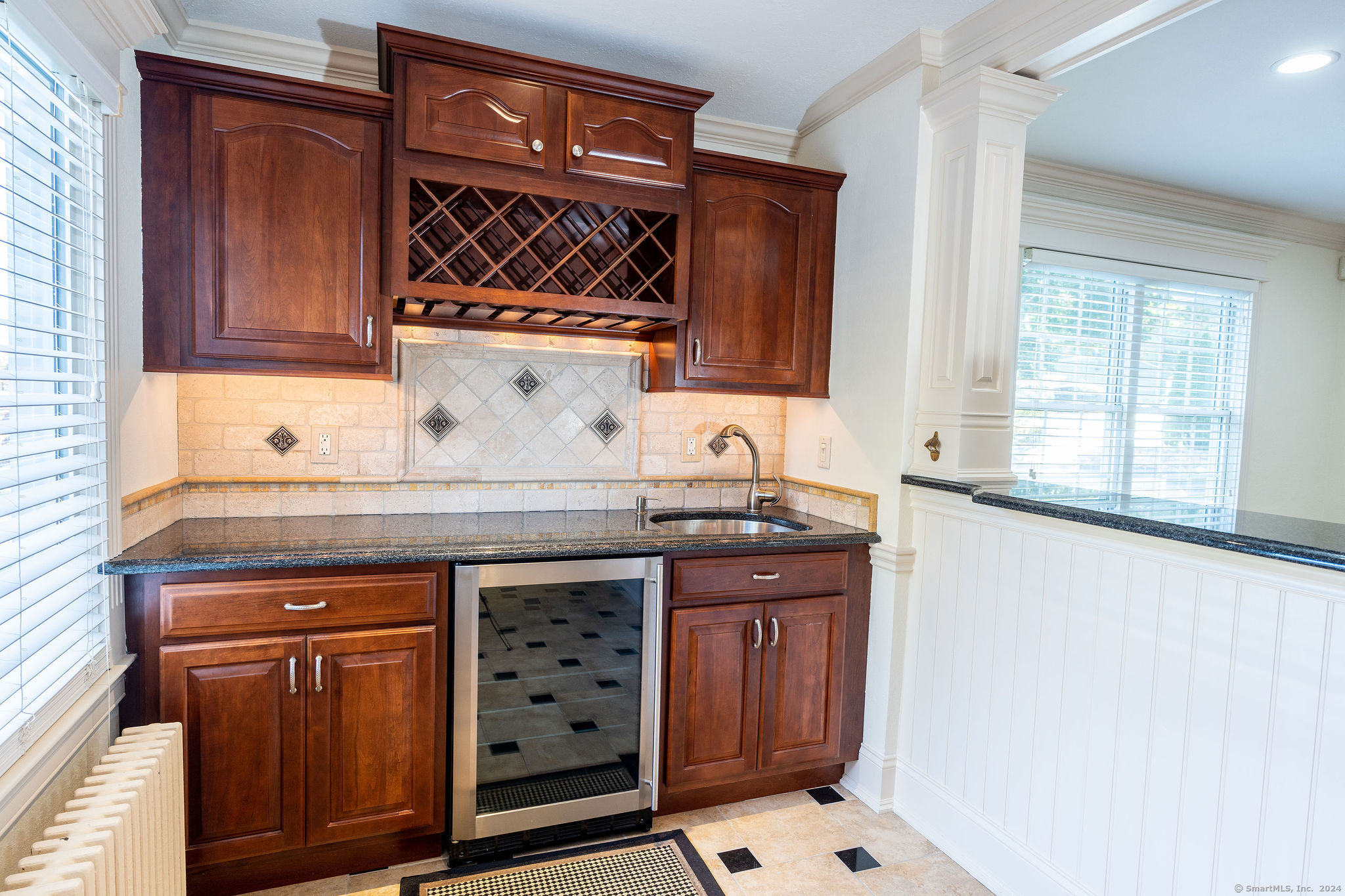 231 Buckingham Street Watertown, CT 06779 - Photo 17 of 30 a kitchen with a sink and cabinets