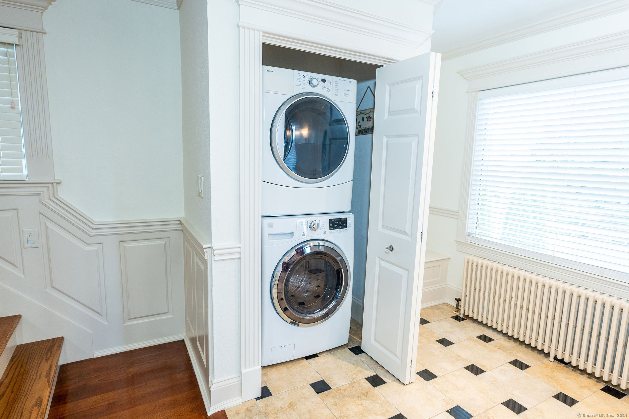 231 Buckingham Street Watertown, CT 06779 - Photo 18 of 30 a view of a bedroom with washer and dryer