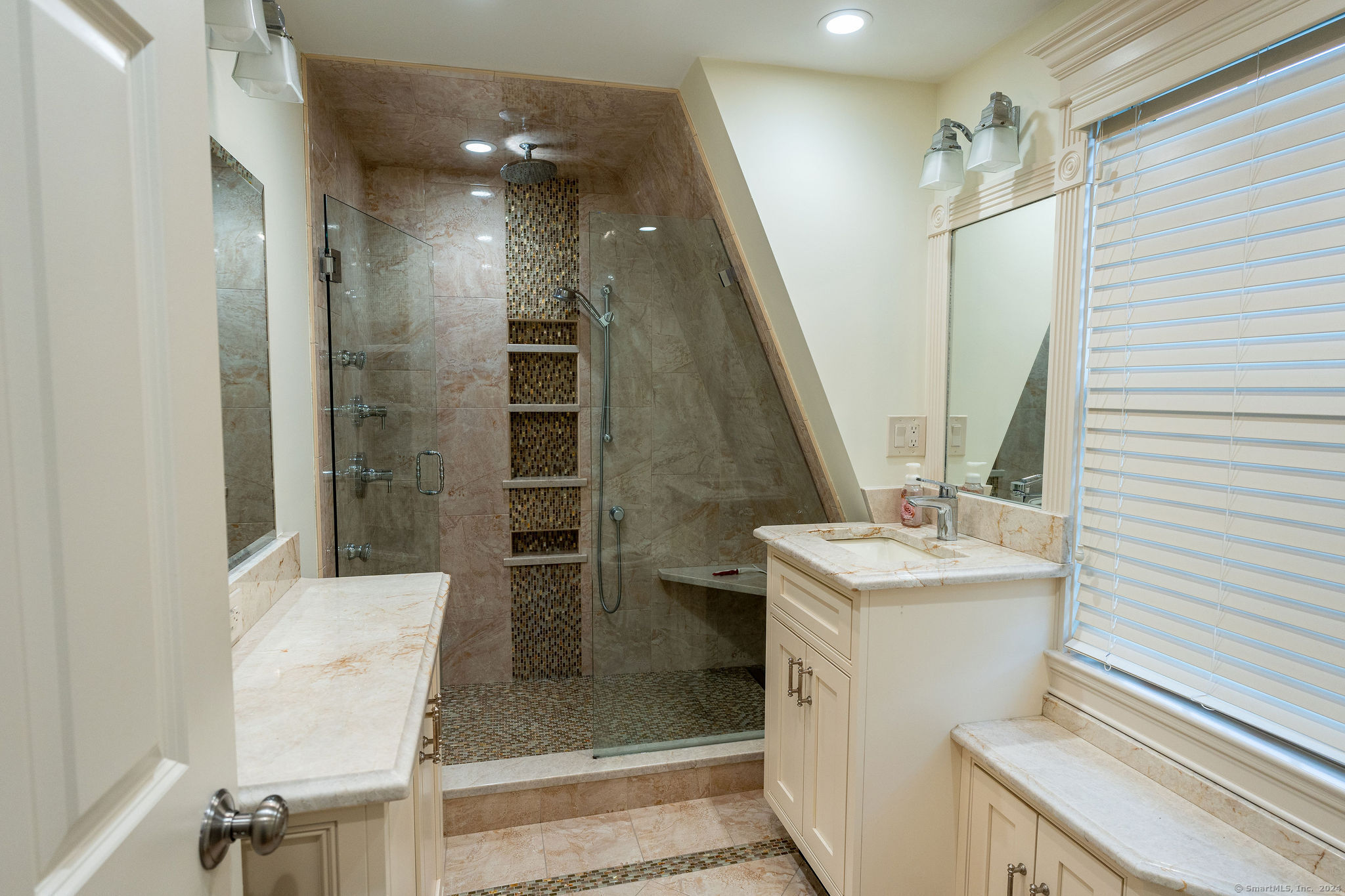 231 Buckingham Street Watertown, CT 06779 - Photo 24 of 30 a bathroom with a sink a toilet and shower