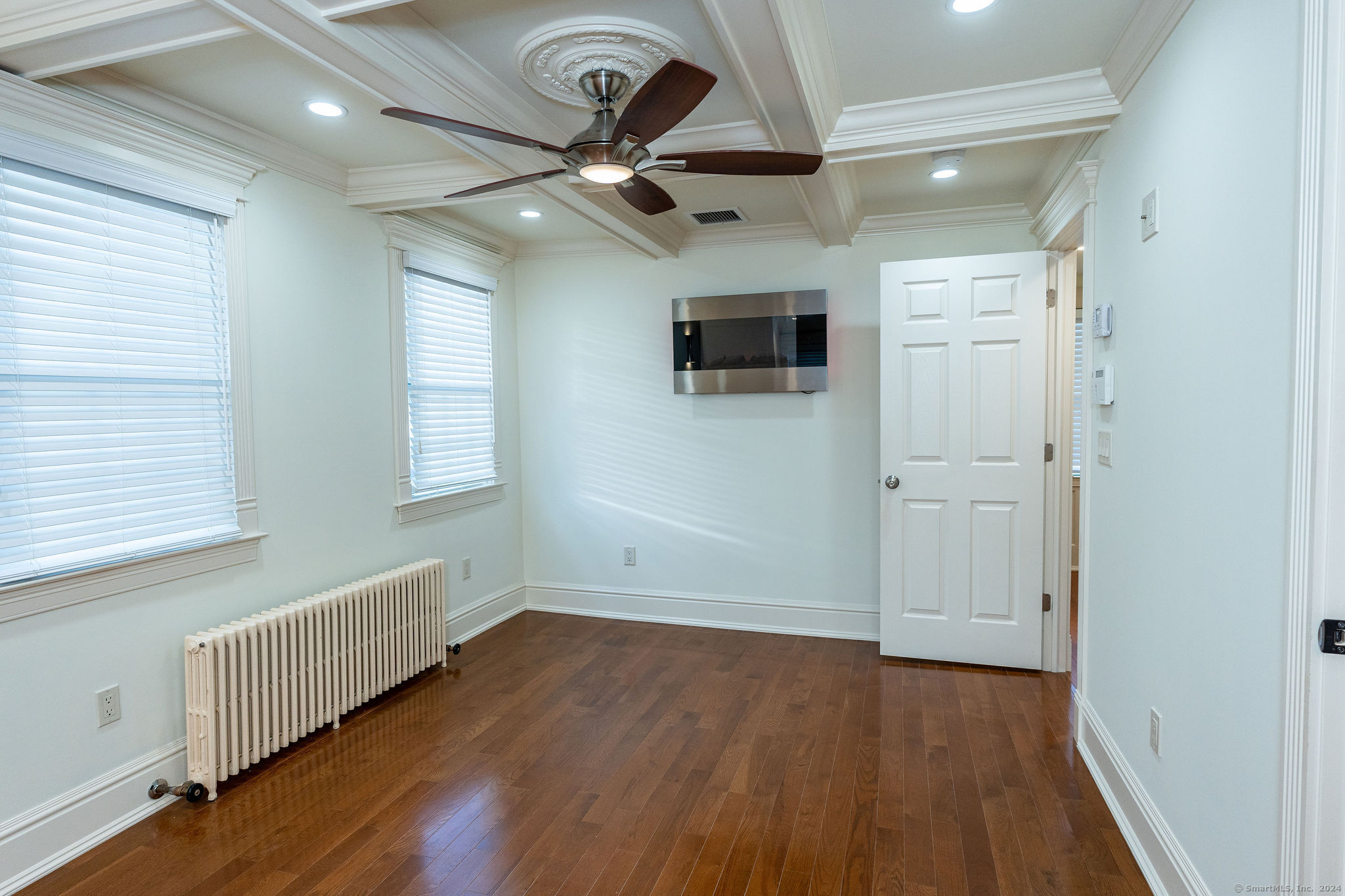231 Buckingham Street Watertown, CT 06779 - Photo 26 of 30 wooden floor in an empty room with a window