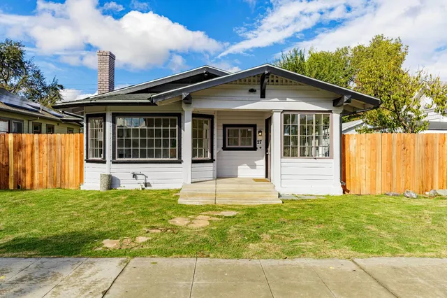 a view of a house with garden