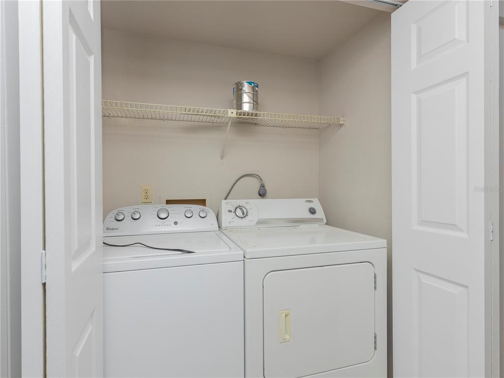 4356 Southwest 20th Lane Gainesville, FL 32607 - Photo 10 of 15 a utility room with dryer and washer