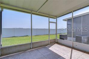 4744 Pond Ridge Drive Riverview, FL 33578 - Photo 5 of 18 a view of an empty room with a window