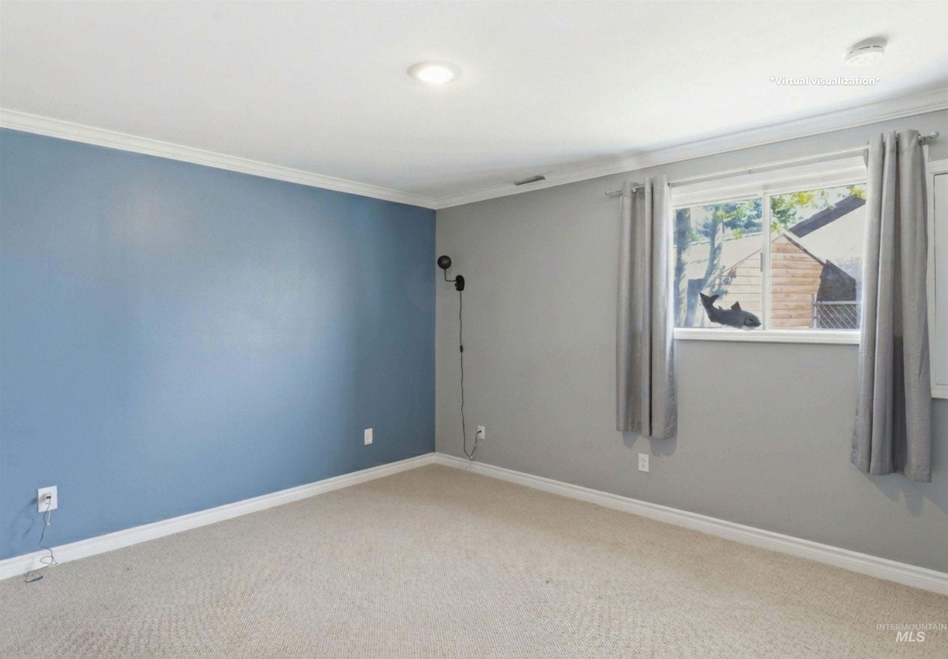 1540 Pine Cone Road Moscow, ID 83843 - Photo 29 of 49 Carpeted room featuring a single window, recessed lighting, and crown molding
