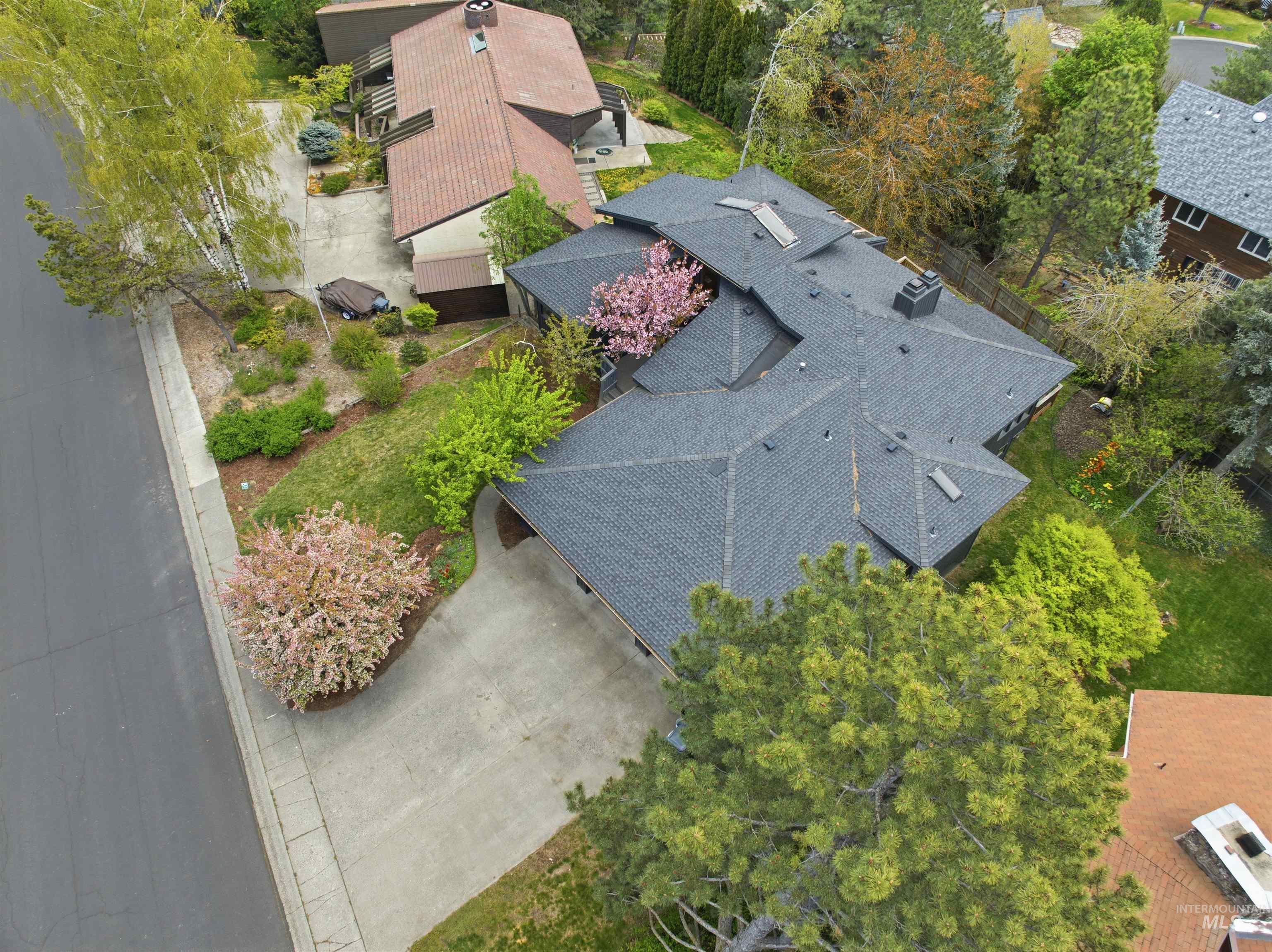 1540 Pine Cone Road Moscow, ID 83843 - Photo 46 of 49 Asphalt shingle roof with multiple gables