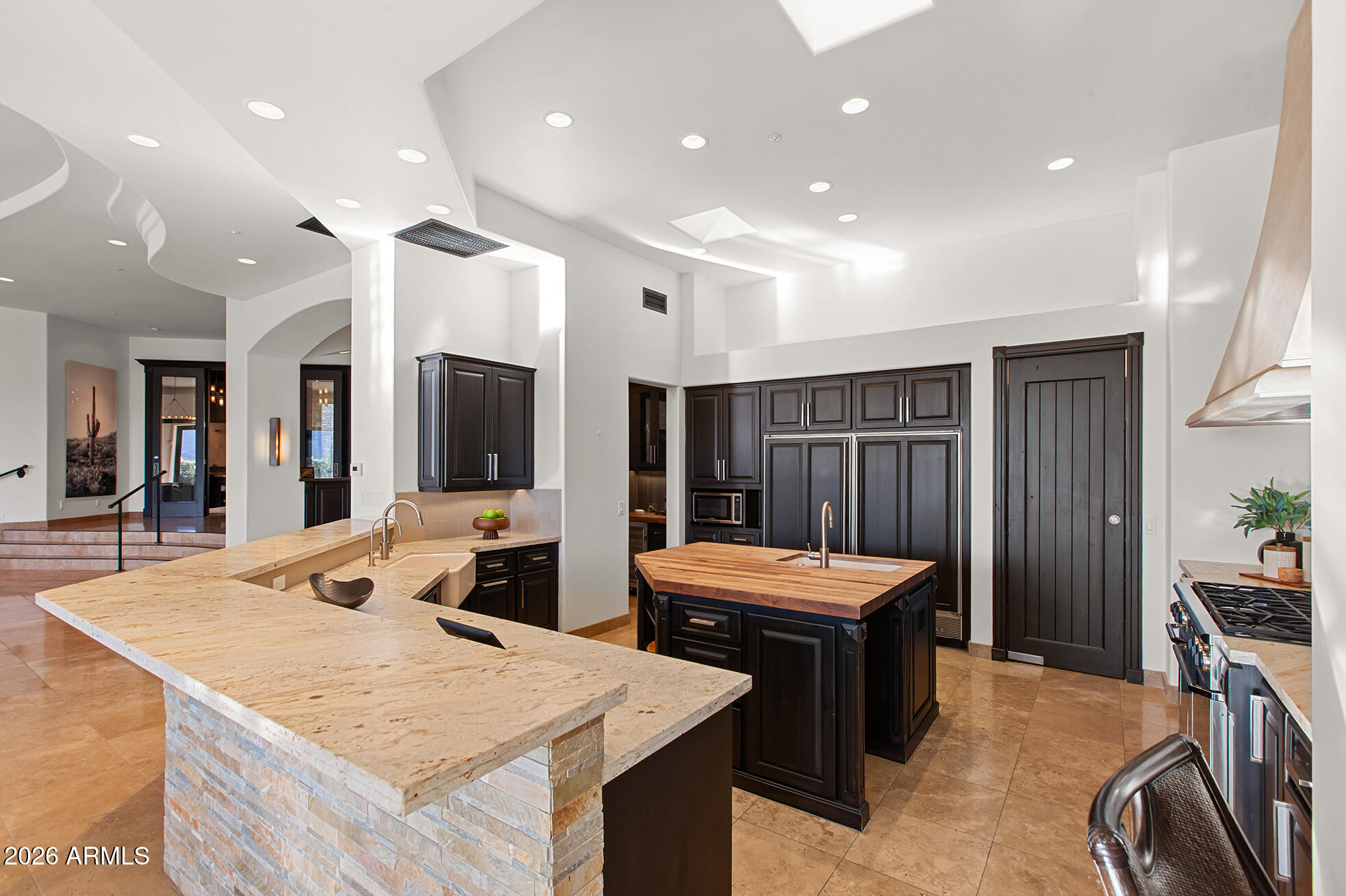 6207 East Indian Bend Road Paradise Valley, AZ 85253 - Photo 15 of 42 Kitchen w island, stainless steel appl