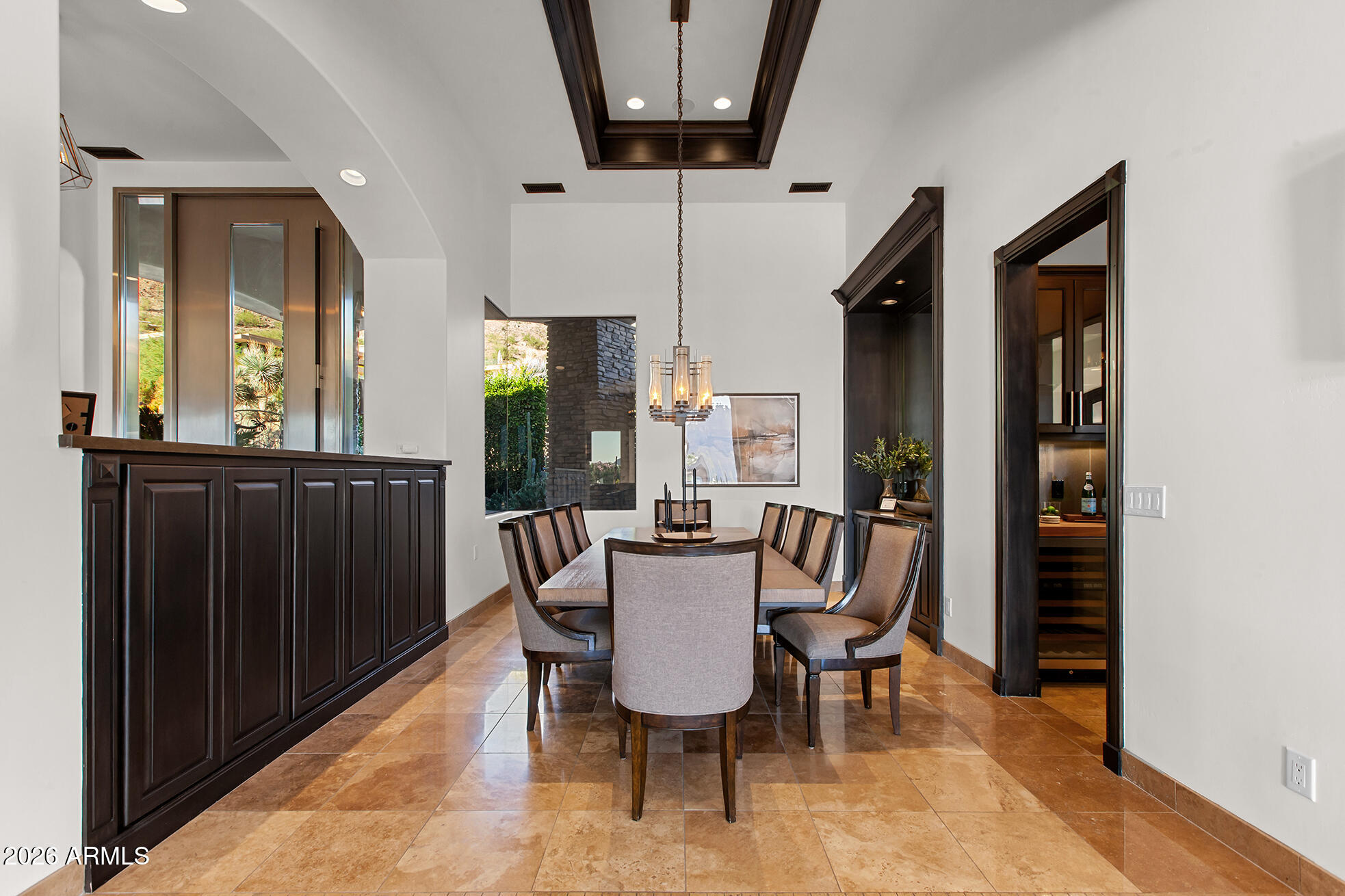 6207 East Indian Bend Road Paradise Valley, AZ 85253 - Photo 17 of 42 a dining room with furniture and window