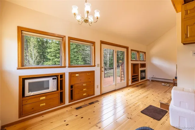 a view of a room with wooden walls