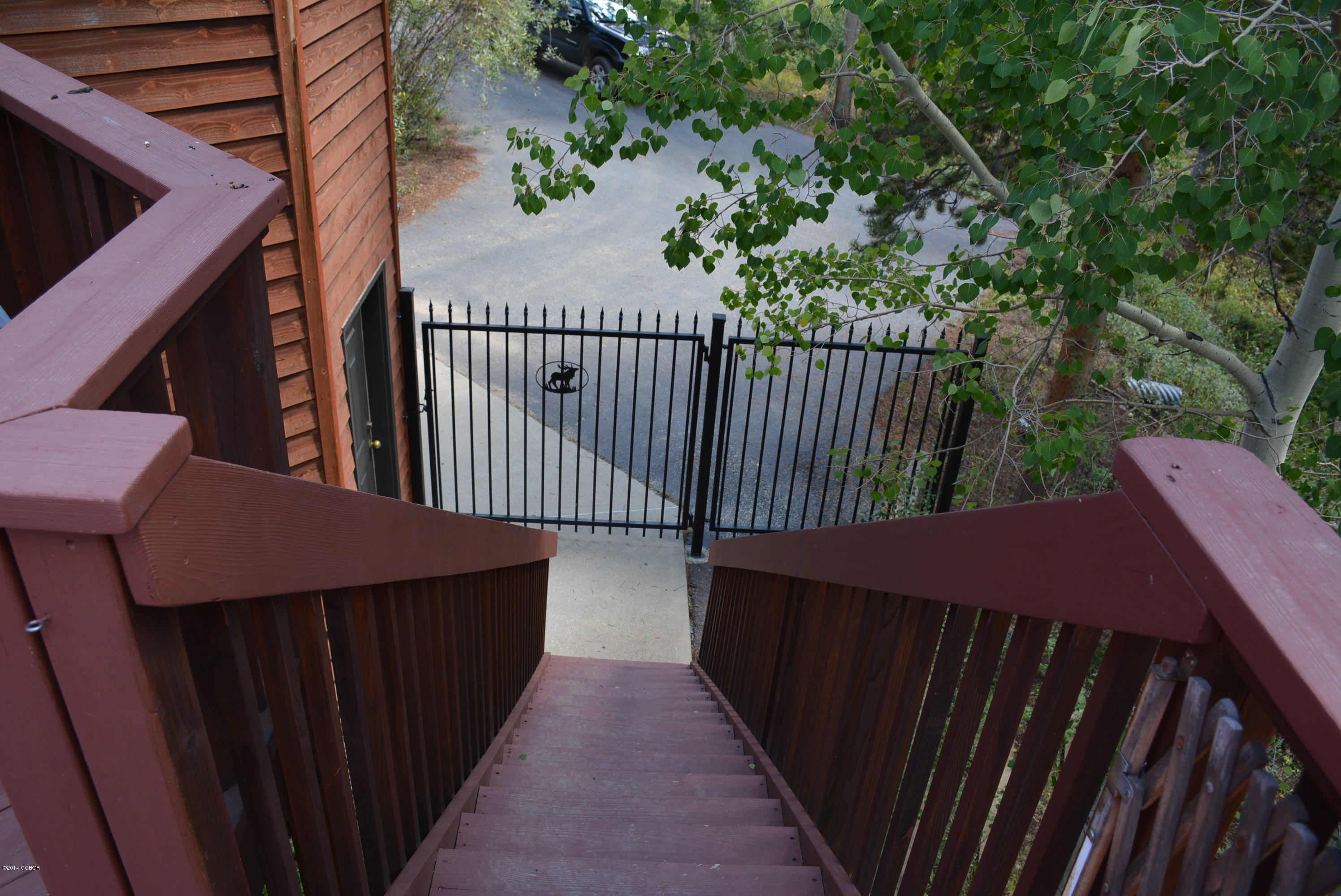 173 Deer Rd/cty Road Fraser, CO 80442 - Photo 15 of 39 Ground Floor Entry to Deck from Fenced Y