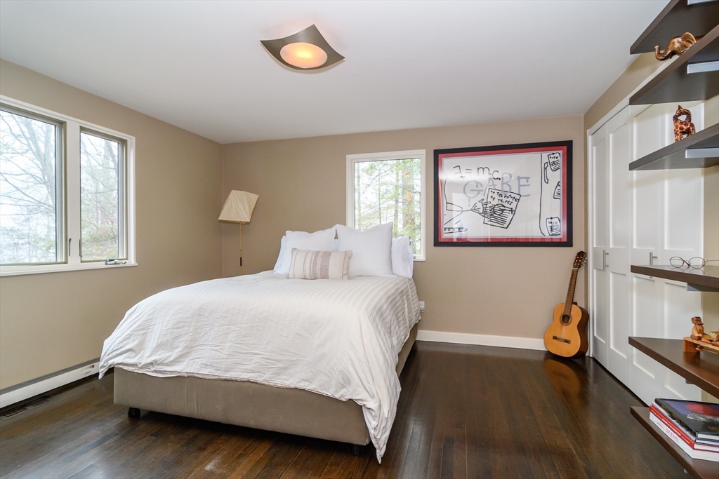 41 Grove Street Wayland, MA 01778 - Photo 13 of 24 a bedroom with a bed and a window
