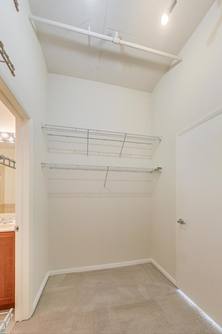 950 West Monroe Street, Unit 608 Chicago, IL 60607 - Photo 25 of 44 a view of a room with racks on the wall