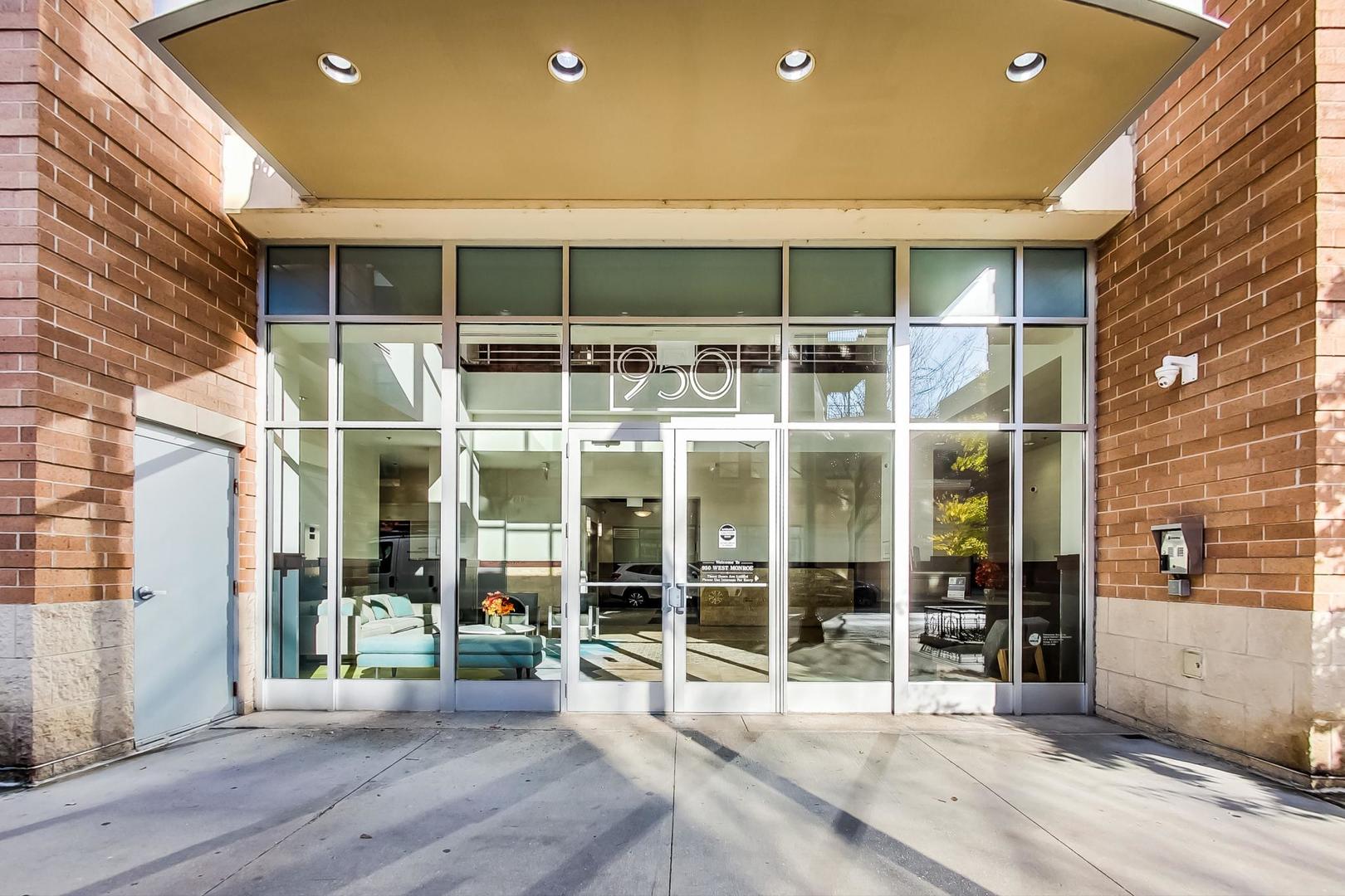 950 West Monroe Street, Unit 608 Chicago, IL 60607 - Photo 4 of 44 a view of a building with a glass door