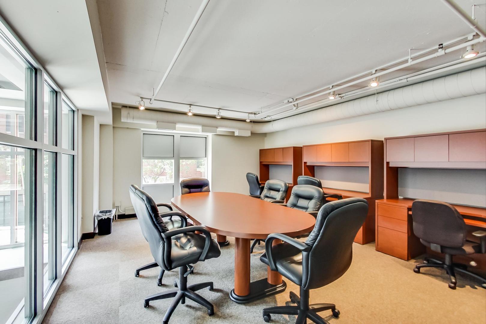 950 West Monroe Street, Unit 608 Chicago, IL 60607 - Photo 41 of 44 a view of a dining room with furniture and a window
