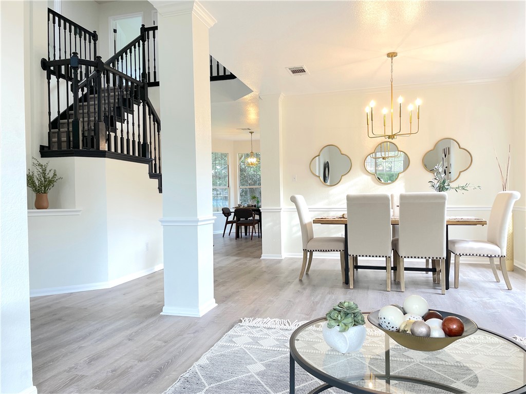 7125 Wandering Oak Road Austin, TX 78749 - Photo 1 of 1 a view of a livingroom and dining room