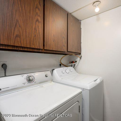 117 Lemon Road Howell, NJ 07731 - Photo 27 of 31 a utility room with dryer and washer