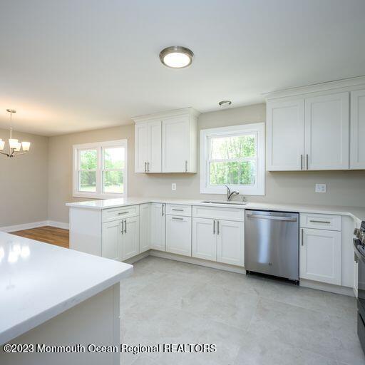 117 Lemon Road Howell, NJ 07731 - Photo 4 of 31 a kitchen with a white cabinets and window